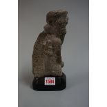 Antiquities: an interesting Indian carved stone figure, on fitted wood stand, 23cm high.