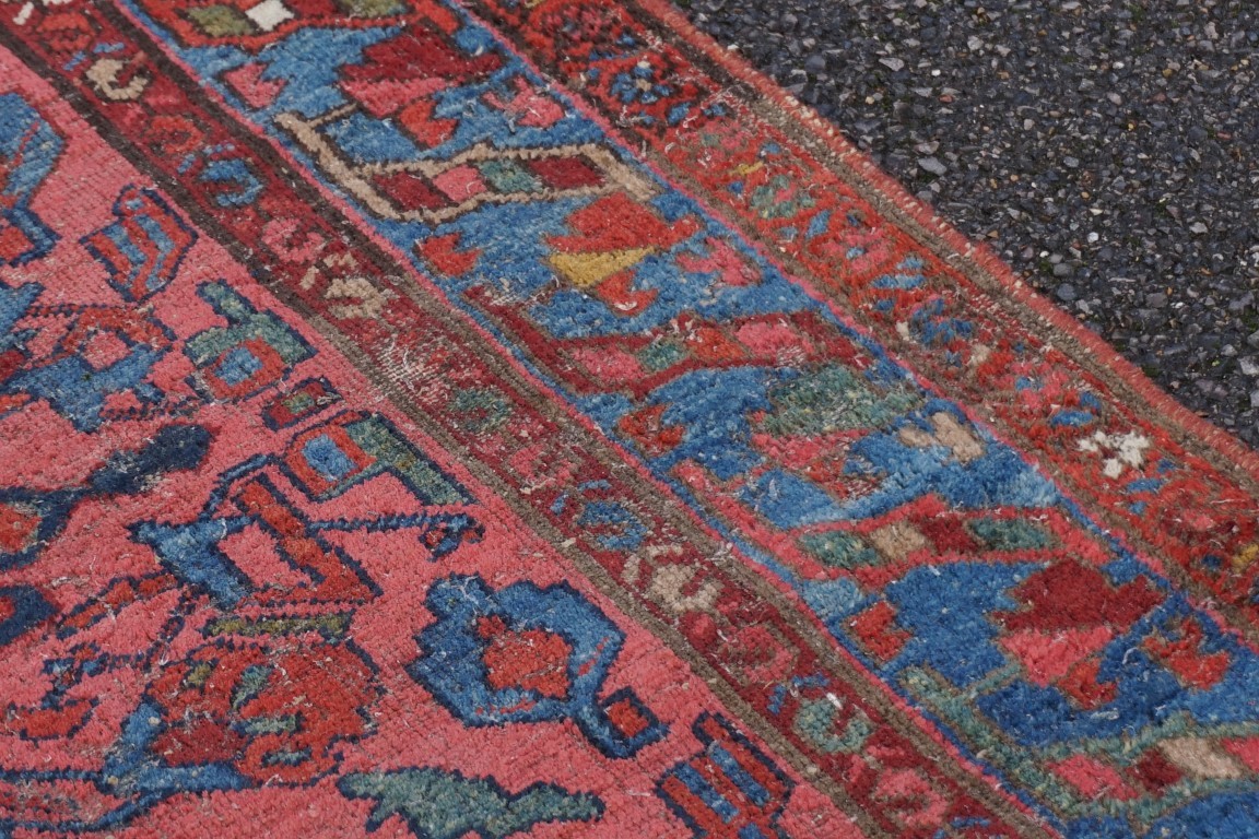 A Persian rug, having geometric borders, 186 x 103cm; together with another Persian rug. - Image 2 of 4