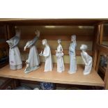 Six Lladro figures, largest 27cm high.