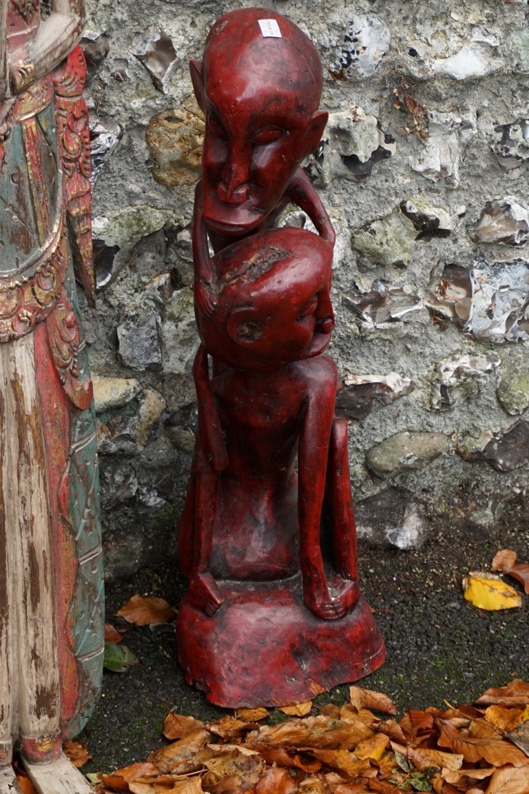 A red stained tribal figure; together with another figure; and a carved figure group. This lot can - Image 5 of 6