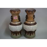 An unusual pair of Chinese crackle glaze vases, late Qing, seal mark to base, 26cm high.
