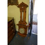 A large and impressive exhibition quality Victorian carved oak wall barometer, by Dollond, London,