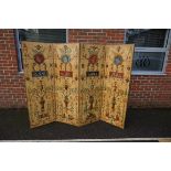 A good 19th century painted leather four-fold screen, with neo-classical decoration and brass