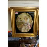 (THH) Two antique silk embroidered pictures of ladies, largest 20 x 18cm oval, each in verre