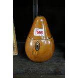 An antique fruitwood pear tea caddy, 15cm high.
