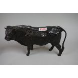 A bronze bull, 14.5cm high.