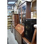 An antique mahogany and inlaid bureau bookcase, 105cm wide.