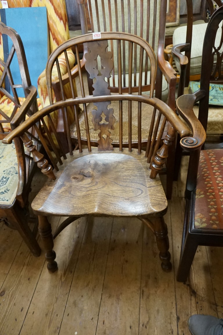 A good yew and elm Windsor armchair, with crinoline stretcher.