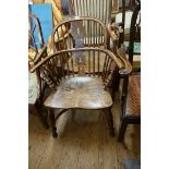 A good yew and elm Windsor armchair, with crinoline stretcher.