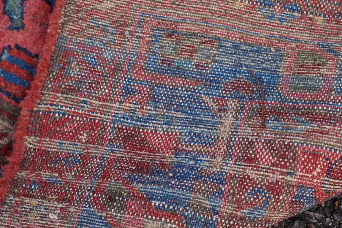 A Persian rug, having geometric borders, 186 x 103cm; together with another Persian rug. - Image 4 of 4