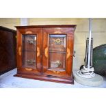 An Edwardian mahogany and inlaid smoker's cabinet, 30cm wide.