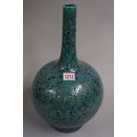 A Chinese mottled green glazed baluster vase, impressed Qianlong seal mark to base, 38.5cm high.