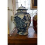 A large Chinese blue white inverted baluster vase, Qing, 36cm high, (a.f.); with associated cover.