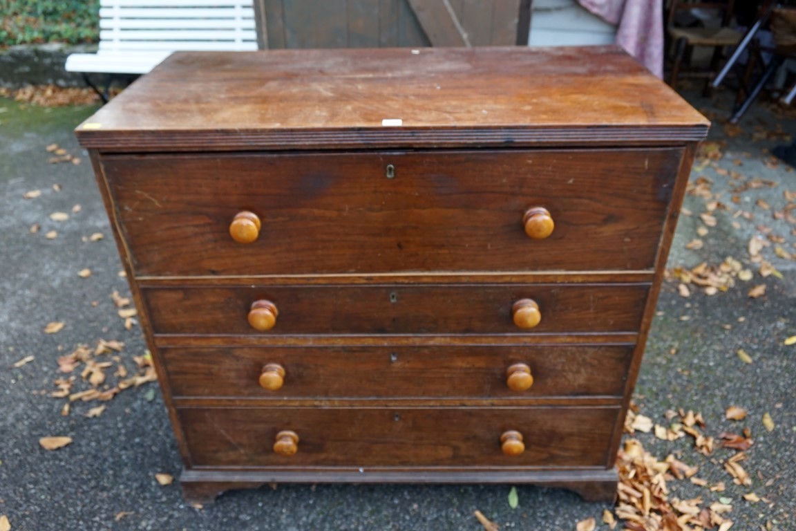 An antique oak chest of four drawers, converted from a secretaire, 101cm high x 98cm wide x 53cm