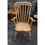 A beech comb back kitchen chair. This lot can only be collected on Saturday 19th December (9-2pm).