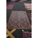 (THH) A Persian rug, having allover floral decoration, 192 x 128cm.