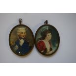 A pair of portrait miniatures of Horatio Nelson and Lady Hamilton, oil, 8.1 x 6.4cm oval.