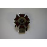 Automobilia: an enamel 'The Order of the Road' car radiator badge.