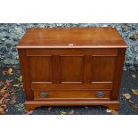 A contemporary mahogany storage box having rising lid.This lot can only be collected on Saturday