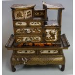 A good Japanese lacquer table cabinet, Meiji, 38cm high x 34.5cm wide.