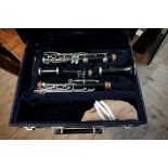 A Conn symphony clarinet, No. H76277, in fitted case.