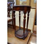 A reproduction mahogany stick stand, 36cm diameter.