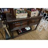 (THH) An antique oak two drawer side table, 114.5cm wide.