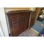 A collection of Victorian linenfold oak panels, by repute from a pulpit, largest panel 110 x 103cm.