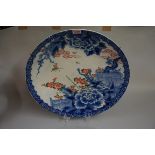 A large Japanese blue and white charger, impressed mark, 45.5cm diameter.