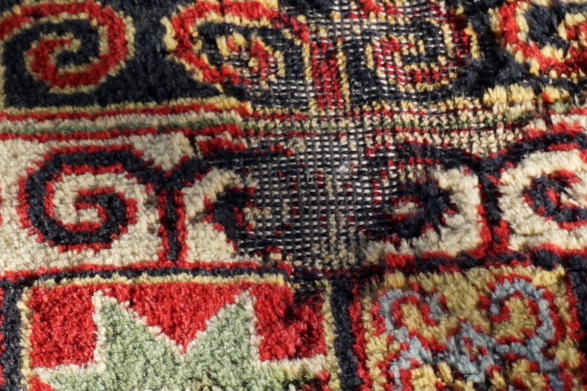 A Persian rug, having geometric borders, 198 x 140cm; together with one other rug having floral - Image 2 of 5