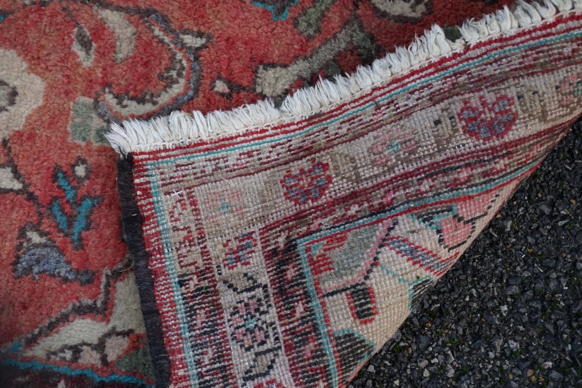 A Persian rug, having geometric borders, 198 x 140cm; together with one other rug having floral - Image 5 of 5