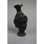 (THH) After the Antique: a Grand Tour bronze classical bust jug, 14cm high.