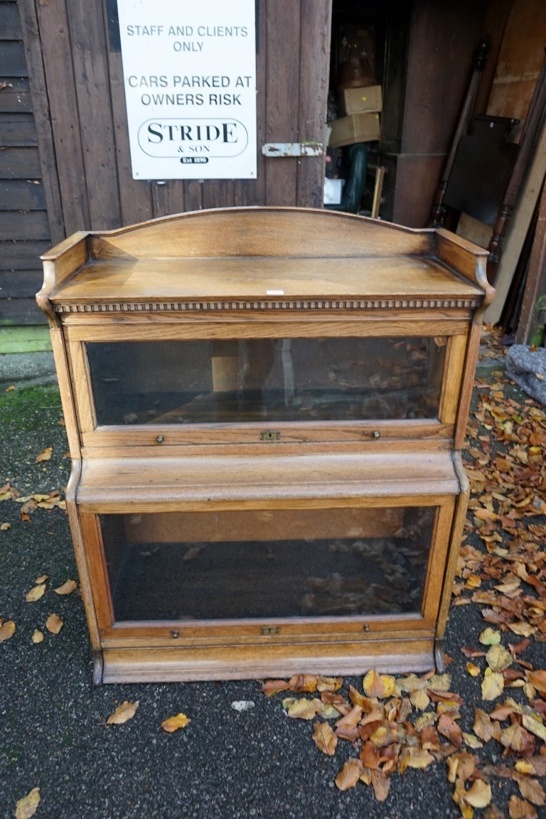 A Lebus oak sectional bookcase, 88cm wide x 44cm deep x 108cm high. This lot can only be collected