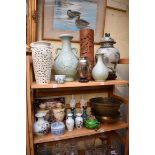 A collection of Chinese and Japanese ceramics and works of art. (two shelves)