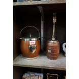 Two ship's timber items, comprising: an HMS Ganges teak and brass table lamp, 30cm high; and an