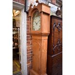 A 19th century Welsh pine 30 hour longcase clock, the 12in arched painted dial inscribed 'T Evans,