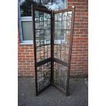 An early 20th century oak framed leaded glass two fold screen, 177 x 102cm.