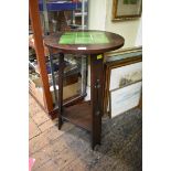 A Liberty oak and tile inset occasional table, stamped 'Liberty 15271', 40.5cm diameter.