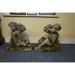 (THH) A large antique pair of carved sandstone or composition stone putti, 61cm high.