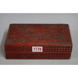 A Chinese cinnabar lacquer rectangular box and cover, 21cm wide.