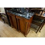 A pair of French Empire style mahogany and marble top bedside cupboards, 40cm wide.