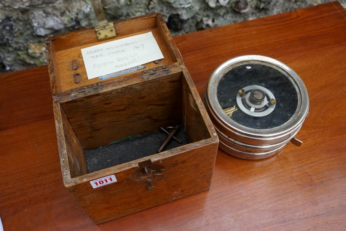 An oak cased racing pigeon clock. This lot can only be collected on Saturday 19th December (9-2pm).