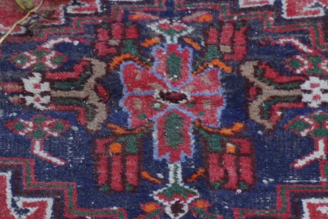 An old Persian rug, having central medallion with floral borders, 148 x 110cm. - Image 2 of 3