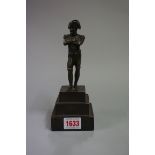 A bronze figure of Napoleon Bonaparte, on stepped plinth, 20cm high.