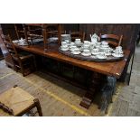 A large oak refectory table, with cleated end four plank top, 243.5cm long.