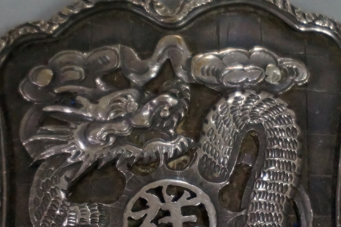 A Chinese silver belt buckle, by Kwan Wo, relief decorated with dragons, each half 6.5 x 5cm, 63g. - Image 2 of 4