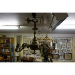 A large brass six branch ceiling light, 60cm high.