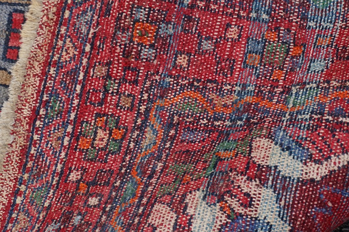 A Persian rug, having geometric borders, 186 x 103cm; together with another Persian rug. - Image 3 of 4