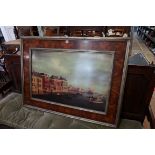 A good reproduction mahogany and gilt wood frame, the whole 89 x 120cm, enclosing a Dutch print.