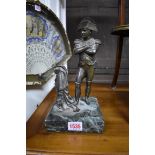 An antique bronze figure of Napoleon Bonaparte, on green marble base, 25.5cm high.